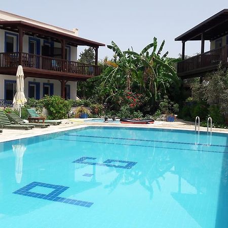Paradise Garden Gumusluk Evleri Aparthotel Exterior photo
