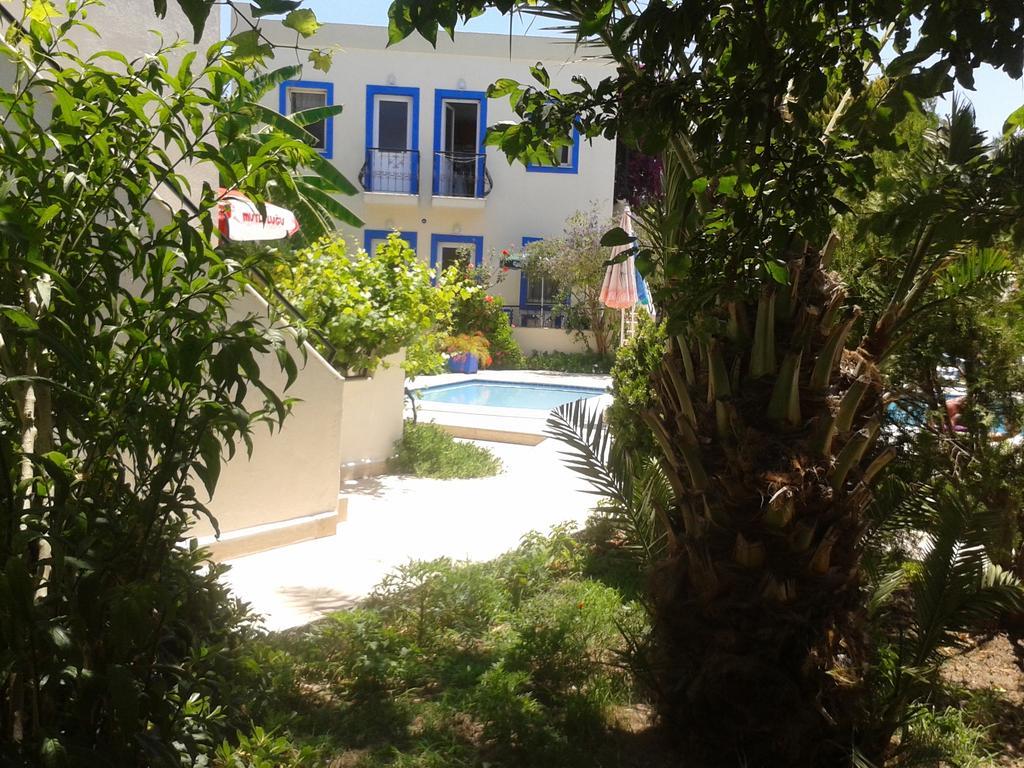 Paradise Garden Gumusluk Evleri Aparthotel Exterior photo