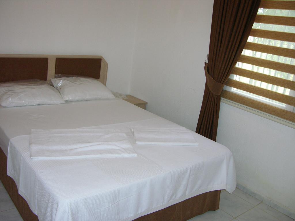 Paradise Garden Gumusluk Evleri Aparthotel Exterior photo