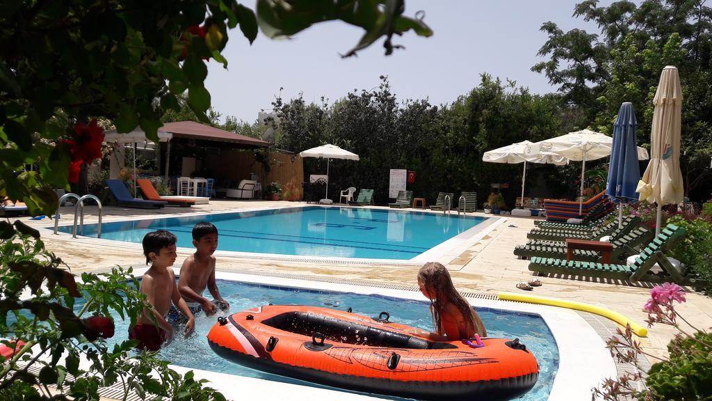 Paradise Garden Gumusluk Evleri Aparthotel Exterior photo