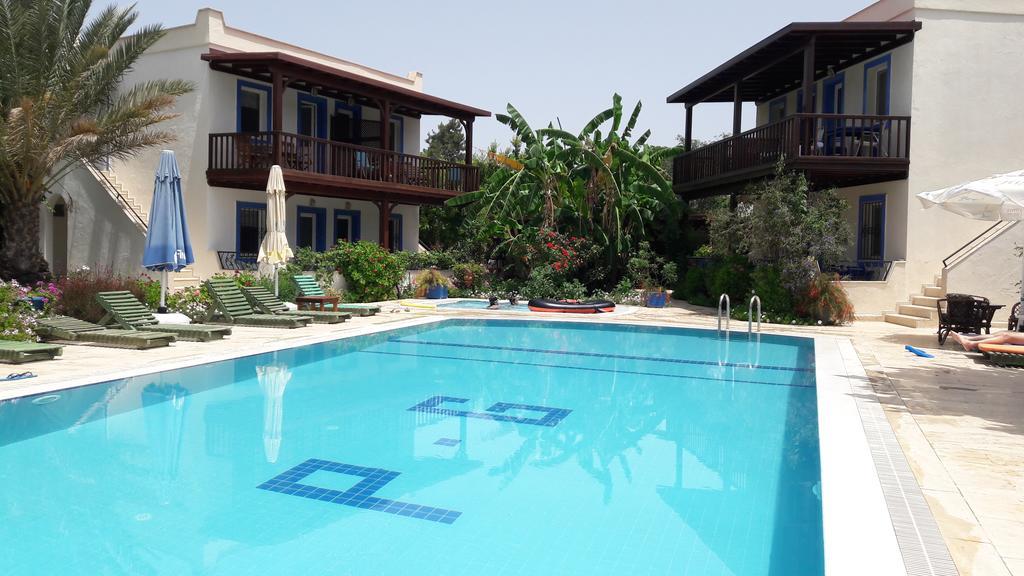 Paradise Garden Gumusluk Evleri Aparthotel Exterior photo