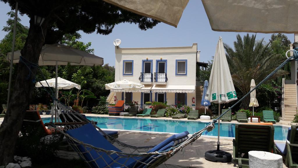 Paradise Garden Gumusluk Evleri Aparthotel Exterior photo